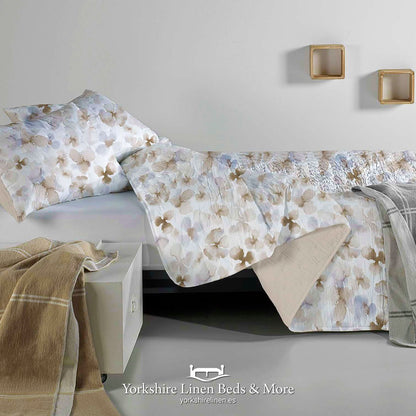 Azucar reversible lightweight bedspread with grey and beige floral pattern on white - Reversible to neutral beige - Yorkshire Linen Mijas Costa.