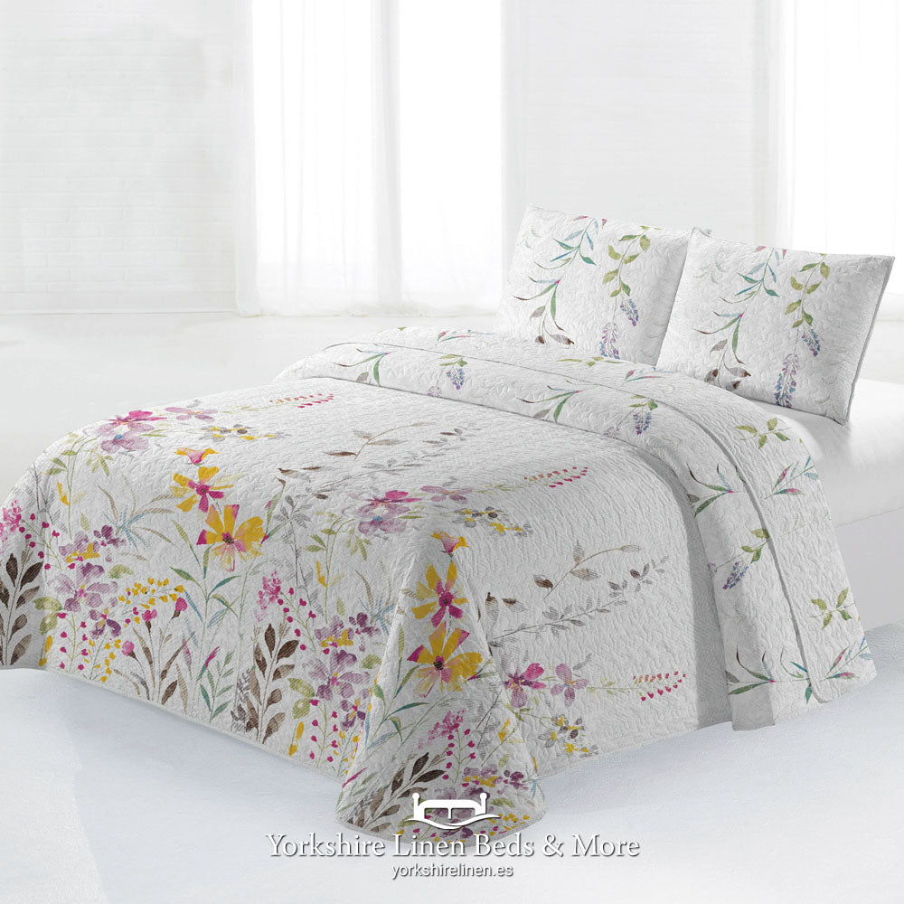 Bright yellow Gandia lightweight bedspread with textured geometric pattern - Mediterranean summer bedding at Yorkshire Linen Mijas Costa.