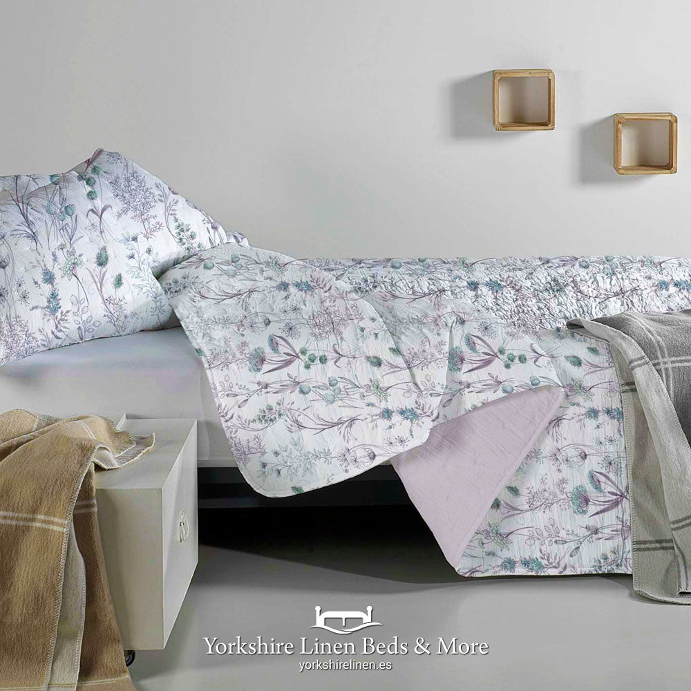 Hortensia floral embossed lightweight Bouti bedspread in soft pastel tones - Ideal summer weight bedding for Spanish homes - Yorkshire Linen Mijas Costa.